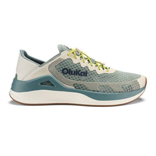 Seagreen and white sand running shoe with yellow laces and textured mesh upper, featuring curved sole design.